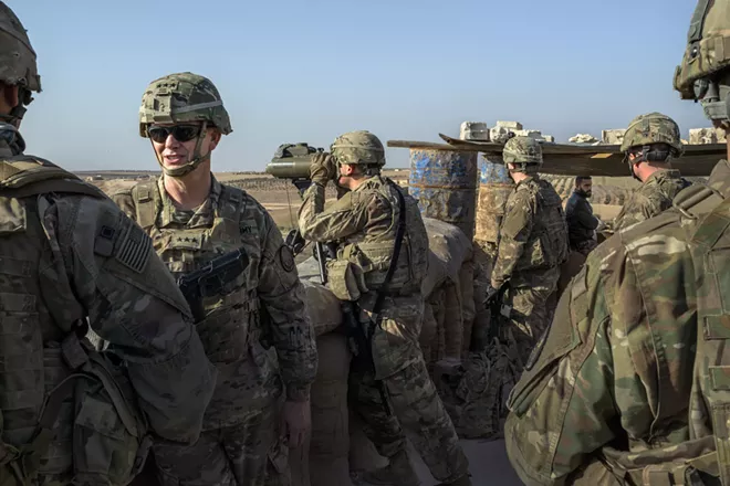 Lt. Gen. Paul Funk, second from left, with Special Forces troops near Manbij, Syria, on Feb. 7, 2018. The U.S. has started withdrawing its troops from Syria, an American military spokesman said on Friday, Jan. 11, 2019, further muddling the Trump administration’s plans for disengagement from one of the Middle East’s most complex battlefields. - MAURICIO LIMA/THE NEW YORK TIMES