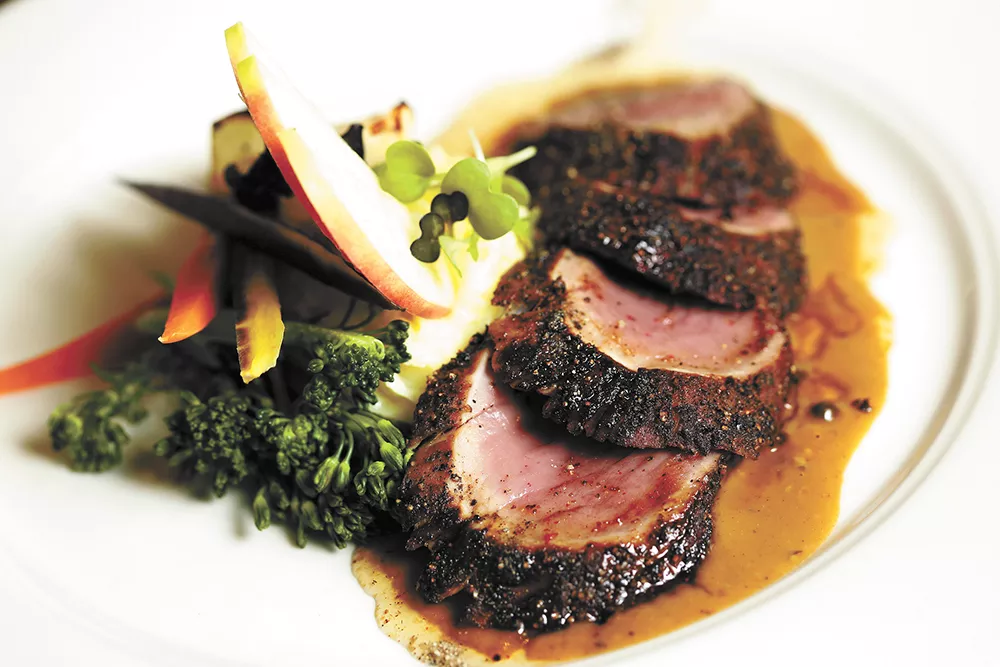 Wild Sage executive chef Charlie Conner's pork tenderloin au poivre from the restaurant's winter menu. - YOUNG KWAK PHOTO