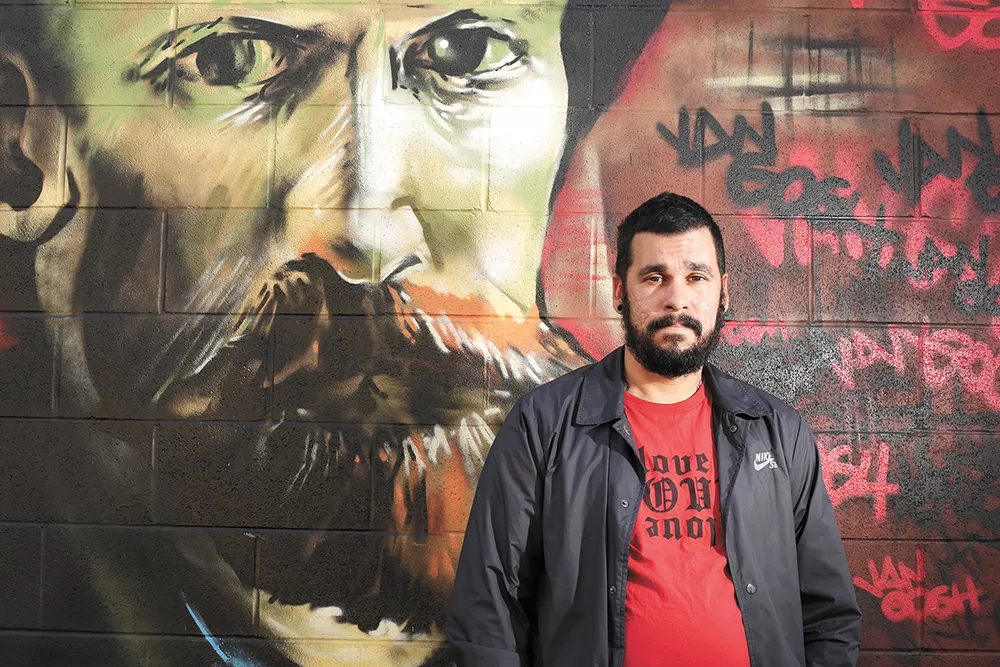 You can see Daniel Lopez's handiwork all around town, including his American Jesus with the pixelated Christ face on Second Avenue. - YOUNG KWAK PHOTO
