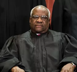 Associate Justice Clarence Thomas joins the rest of the Supreme Court justices in sitting for a group photo in Washington on Nov. 30, 2018. On March 20, 2019, as Curtis Flowers’s lawyer concluded her argument, Thomas asked his first questions from the bench since 2016. Thomas holds the modern record for silence on the bench. Before his questions in 2016, he had gone a decade without asking one. - DOUG MILLS/THE NEW YORK TIMES