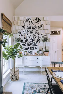 An open-book wall hanging required more than 100 nail holes to install, but one follower declared it, "The most beautiful thing I've ever seen." - ERICK DOXEY PHOTO
