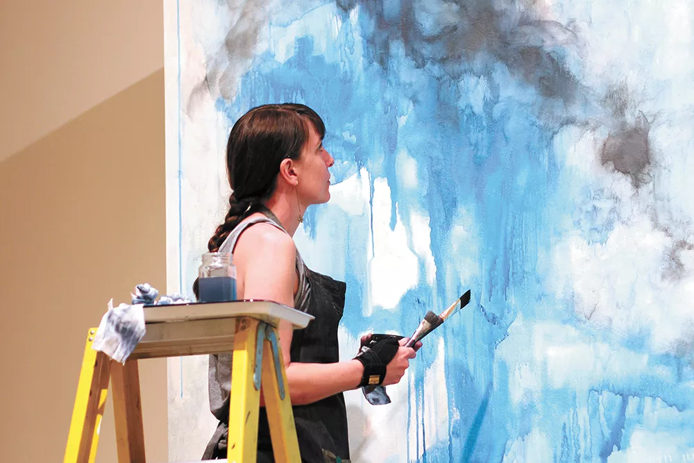 Artist Jen Erickson found painting on a wall instead of canvas surprisingly satisfying. - CARRIE SCOZZARO