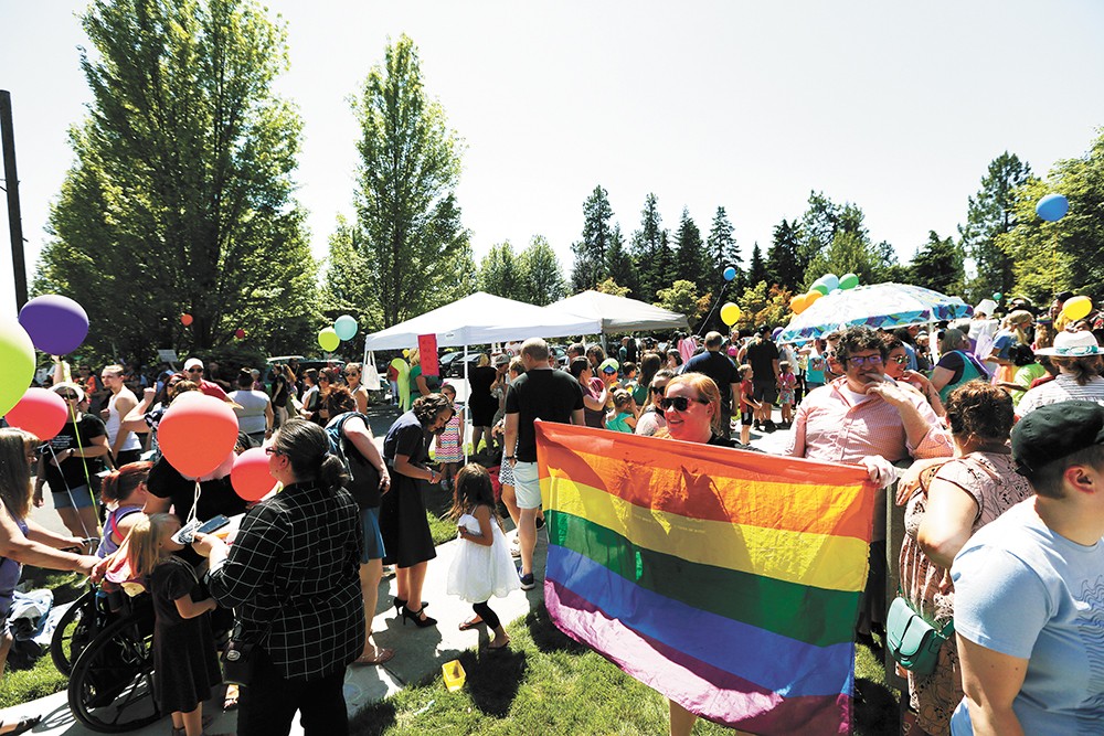 Supporters of Drag Queen Story Hour turned out in colorful droves to the South Hill library earlier this month, aiming to drown out anti-drag protesters. - YOUNG KWAK PHOTO