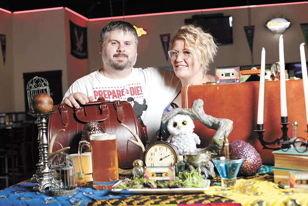 Rewind owners Kris Kilduff and Sara Thorpe with Harry Potter-themed table props for their next pop-up dinner. - YOUNG KWAK PHOTO