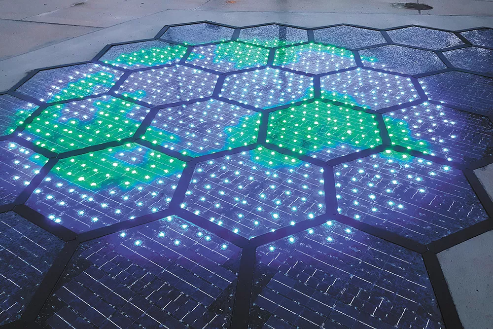 Solar Roadways, based in Sandpoint, aims to literally pave the way to a clean energy future using solar panels like those shown here. The lighting patterns can make lane lines, warning signs and more. - SOLAR ROADWAYS PHOTO