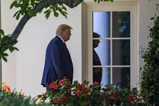 President Donald Trump walks to the Oval Office after returning from a ceremony at the Jamestown Settlement Museum, at the White House in Washington, July 30, 2019. Trump hailed the contributions of African-Americans to the building of the nation during the earlier ceremony on Tuesday paying tribute to democracy in the New World, even as he continued to wage war on some of his most prominent black critics. - SAMUEL CORUM/THE NEW YORK TIMES