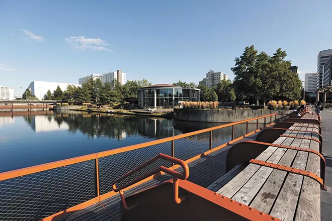 The aging Howard Street South Bridge had to be replaced. The new "orange bridge" is wider, with built-in power and water for events and vendors. The "Get Down" design element by Berger Partnership allows you to get closer to the water. - YOUNG KWAK PHOTO