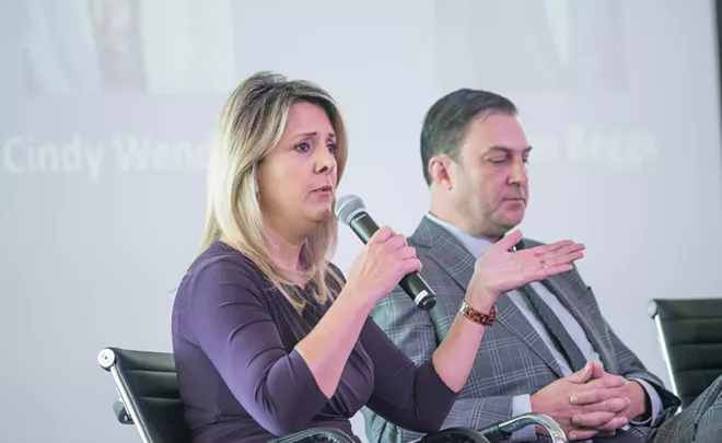 Mayoral candidates Nadine Woodward and Ben Stuckart at yesterday morning's Spokane Homeless Coalition forum. - DANIEL WALTERS PHOTO
