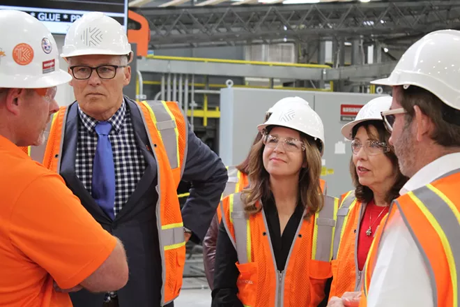 Washington Gov. Jay Inslee (second from left), Commissioner of Public Lands Hilary Franz, and U.S. Sen. Maria Cantwell get a tour of the Katerra cross-laminated timber facility in Spokane Valley on Friday, Sept. 20, 2019. - SAMANTHA WOHLFEIL PHOTO