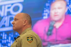 Spokane Sheriff Ozzie Knezovich decries Infowars host Alex Jones at a "Threats We Face" speech Tuesday. - DANIEL WALTERS PHOTO
