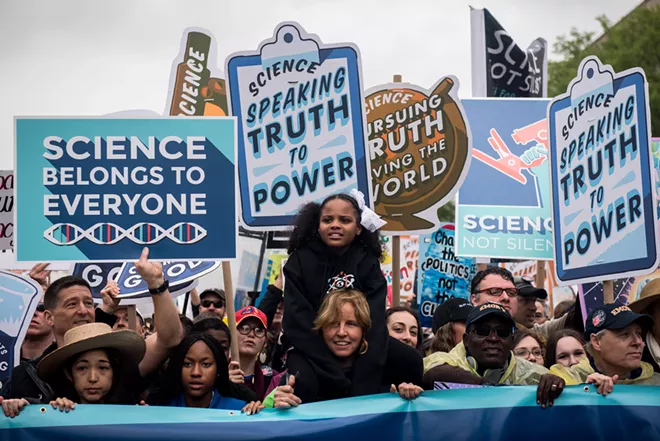 Demonstrators during a global March for Science in Washington, April 22, 2017. All presidents over the past two decades have nudged science to support their policies, but a report out of NYU said the Trump administration has driven federal science to a “crisis point.” - HILARY SWIFT/THE NEW YORK TIMES