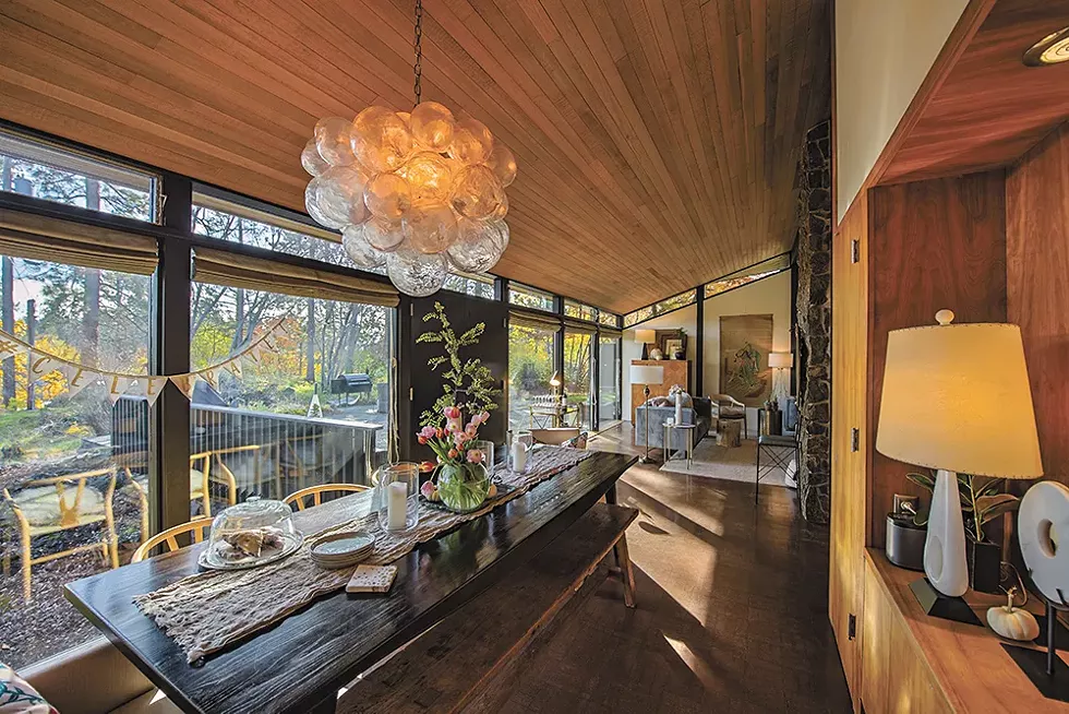 Spokane designer Tammie Ladd was drawn to the wide expanse of floor to ceiling windows in her home, which she says was designed by "one of Spokane's greats in the mid-century era," architect John McGough.|don hamilton photo