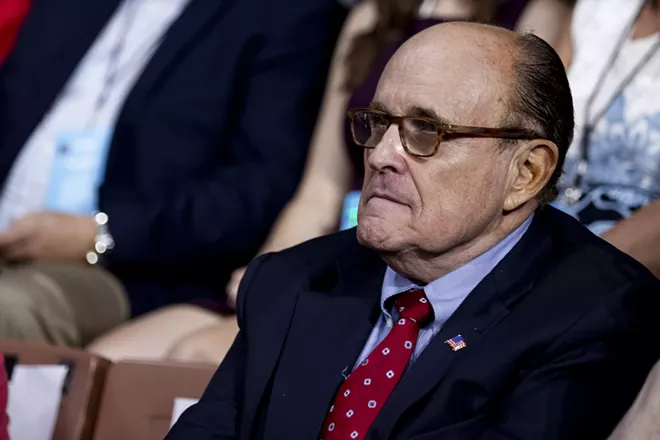 Rudy Giuliani, President Donald Trump's personal lawyer, attends a Keep America Great rally in Manchester, N.H., Aug. 15, 2019. As Giuliani waged a public campaign this year to unearth damaging information in Ukraine about President Trump’s political rivals, he privately pursued hundreds of thousands of dollars in business from Ukrainian government officials, documents reviewed by The New York Times show. - ANNA MONEYMAKER/THE NEW YORK TIMES