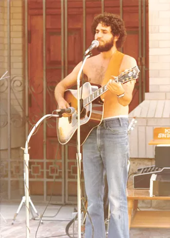 My dad, Ron Criscione, has always felt the most comfortable with a guitar in his hand, seen here around 1980.