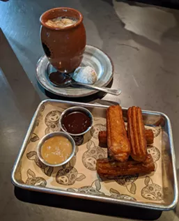 Pro tip: Order both churro dips — chocolate and caramel — for only 25 cents extra. - CHEY SCOTT PHOTO