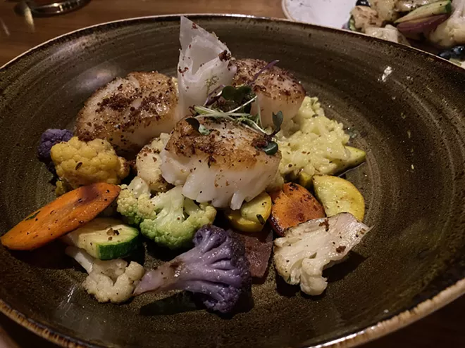 Pan-seared sea scallops with lemon-tarragon risotto, brown butter and local vegetables. - SAMANTHA WOHLFEIL