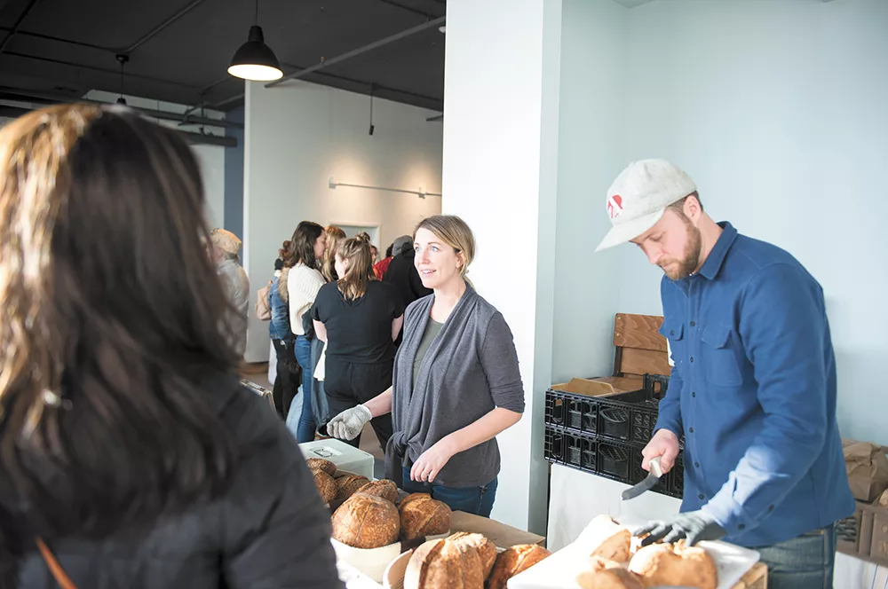 MaK Bread owners Krystle (middle) and Matt Toman at the Lumberbeard Winter Markets. - DEREK HARRISON PHOTO
