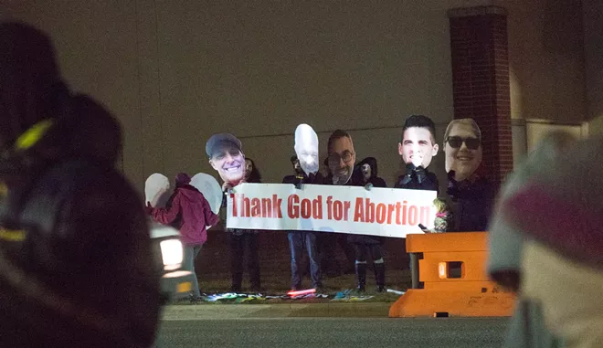Planned Parenthood has repeatedly asked counter-protesters like these to quit it. In recent months, the numbers of counter-protesters have dwindled as a result. - DANIEL WALTERS PHOTO