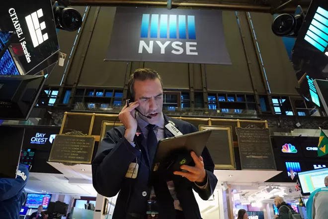 A trader on the floor of the New York Stock Exchange on Tuesday, March 3 2020. The drop in stocks and bond yields on Tuesday suggests investors think the Federal Reserve’s interest-rate cut won’t contain the economic impact of the coronavirus. - BRYAN R. SMITH/THE NEW YORK TIMES
