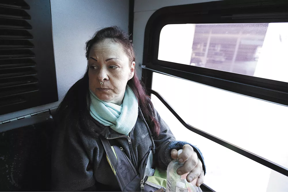 Sharon Belton, who rides the bus on a daily basis during her commute from central Spokane to Spokane Valley to do home health care work. "It's pretty efficient," Belton says. "It's more relaxing than having to actually be the driver and deal with all the chaos." - YOUNG KWAK PHOTO