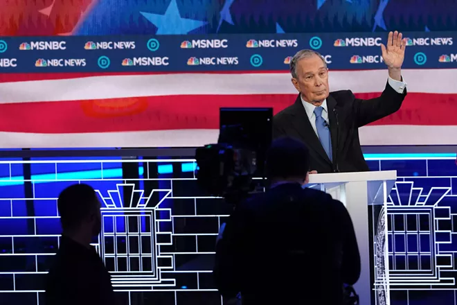 Michael Bloomberg waves from the stage of the Democratic presidential primary debate in Las Vegas, Feb. 19, 2020. - ERIN SCHAFF/THE NEW YORK TIMES
