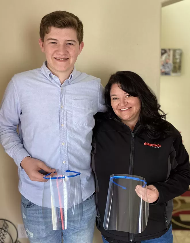Connor Duncan, 16, is using his 3D printer and that of a neighbor to print face shields for his mom, Christina Duncan, a nurse practitioner, and her in-home health care team in Spokane. - PHOTO COURTESY OF THE DUNCANS