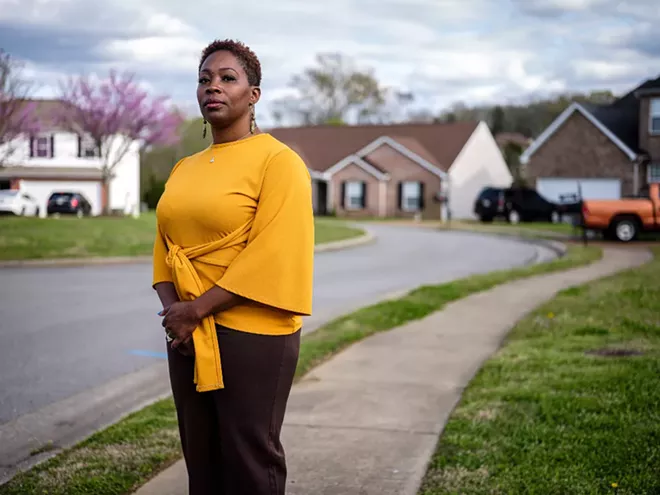 Erica Battle, an education consultant, outside her home in the Nashville suburb of Mount Juliet, April 1, 2020. April was meant to be one of her busiest months, as schools rush to get students ready for standardized testing season. Instead, she is home with her husband and teenage son, trying to figure out how to cut expenses. - WILLIAM DESHAZER/THE NEW YORK TIMES