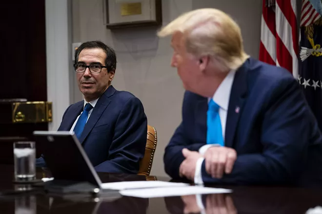 Treasury Secretary Steve Mnuchin and President Donald Trump during an update on the coronavirus small business relief plan at the White House in Washington, April 7, 2020. The White House and congressional Democrats on April 19 closed in on an agreement for a $450 billion economic relief package to replenish a depleted emergency fund for small businesses and to expand coronavirus testing around the country, with votes on the measure possible early this week. - DOUG MILLS/THE NEW YORK TIMES