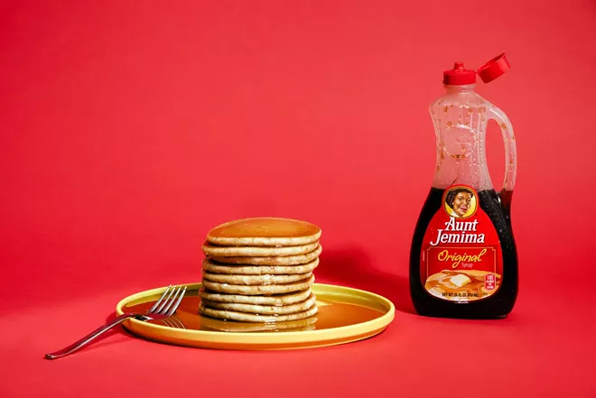 A bottle of Aunt Jemima brand pancake syrup in New York on April 3, 2020. Aunt Jemima, a syrup and pancake mix brand, will get a new name and image after Quaker Oats, its parent company, acknowledged that the brand’s origins were "based on a racial stereotype." - DANIEL DORSA/THE NEW YORK TIMES