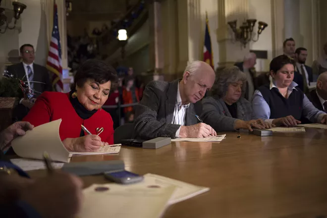 Members of the Colorado Electoral College casting their votes for presidential candidates in Denver on Dec. 19, 2016. States can require members of the Electoral College to cast their votes for the presidential candidates they had pledged to support, the Supreme Court unanimously ruled on Monday, July 6, 2020. - NICK COTE/THE NEW YORK TIMES