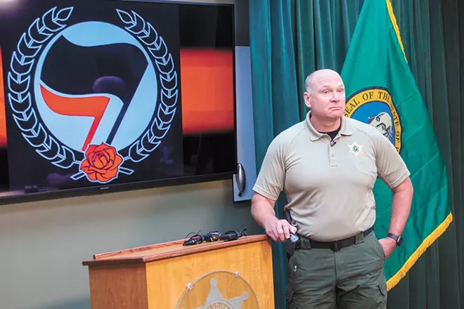 Spokane County Sheriff Ozzie Knezovich speaking to reporters on Sept. 8 about a controversial arrest involving a vocal police critic. - DANIEL WALTERS PHOTO