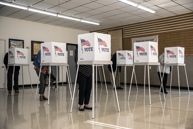 Voters cast their ballots on the first day of early voting in Adel, Iowa, on Monday, Oct. 5, 2020. U.S. officials fear ransomware attacks could be used to lock up voting registration, tabulation and certification systems in November. - KATHRYN GAMBLE/THE NEW YORK TIMES