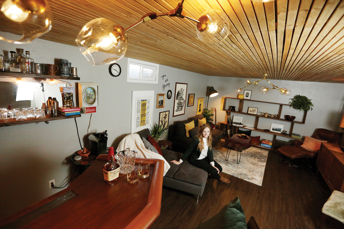 A wood-planked ceiling adds to the cozy ambiance of designer Katie Getman's basement lounge. - YOUNG KWAK PHOTO