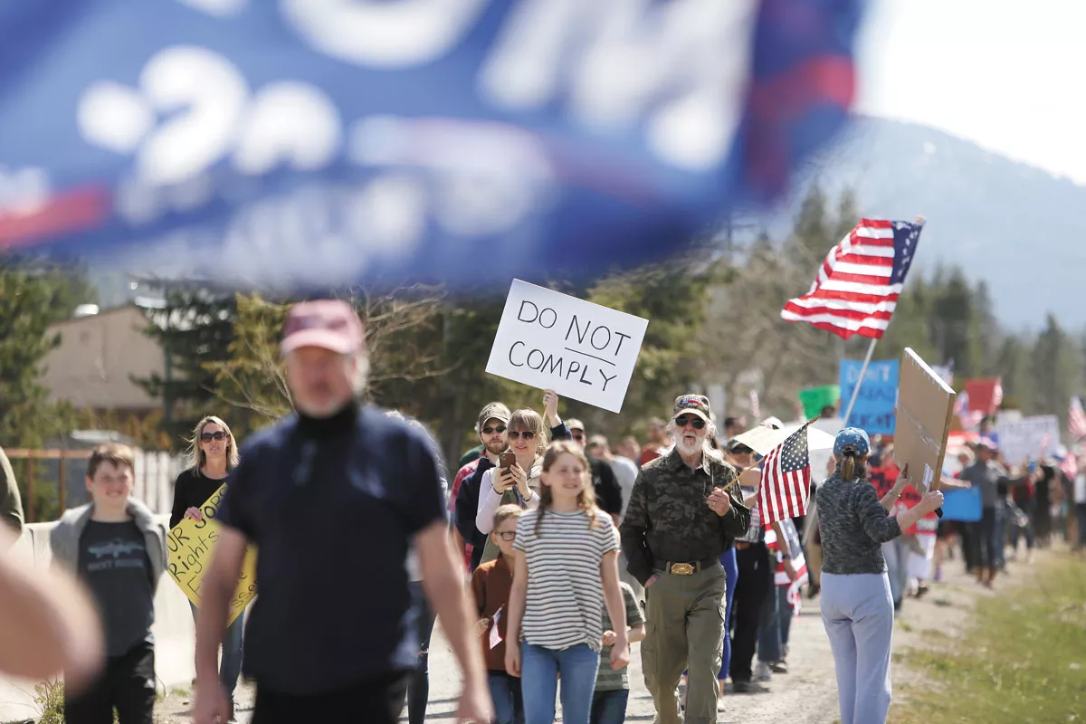 Protesters marching in April against Idaho's stay-home order aimed at slowing the spread of COVID-19. - YOUNG KWAK PHOTO