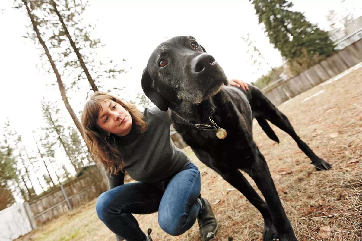 Claire Miller and 13-year-old Labrador Dewey were both zapped by an electrified metal vault cover in downtown Spokane. - YOUNG KWAK PHOTO