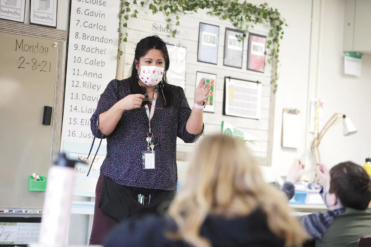 Sheridan Elementary fourth-grade teacher Christina Grieshaber teaches math to her class. - YOUNG KWAK PHOTO