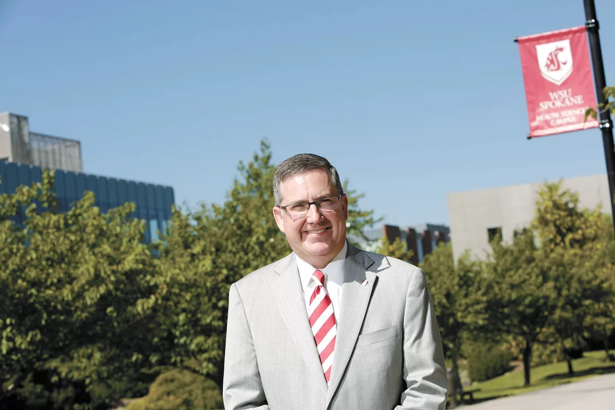 WSU President Kirk Schulz and other administrators argue that a competitive athletics program brings outsized returns in national recognition, student recruitment and intercollegiate partnerships. - YOUNG KWAK PHOTO