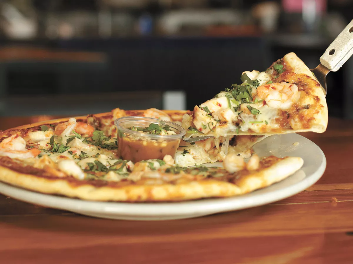 Fans of Rock City Thai pizza can also enjoy the popular pie fresh at home with a take-and-bake version.