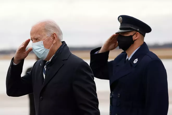 President Joe Biden salutes as he departs Air Force One at Joint Base Andrews in Maryland, March 1, 2021. - YURI GRIPAS/THE NEW YORK TIMES