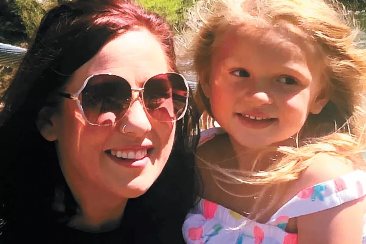 Kassie Dewey, 35, was found dead in her garage on April 11. Her 5-year-old daughter, Lilly, survived the attack.