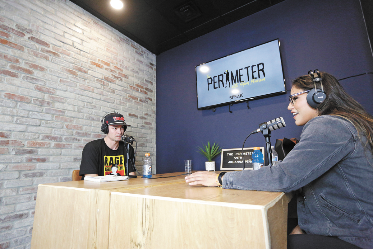 Host Adam Morrison, left, interviews Ultimate Fighting Championship competitor Julianna Peña during his podcast in May. - YOUNG KWAK PHOTO