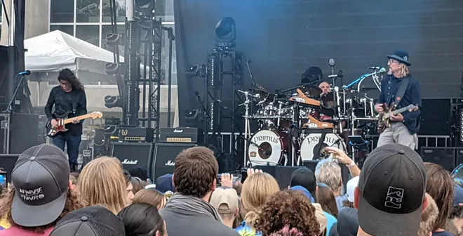 Primus at the Spokane Pavilion Friday, Aug. 13. From left: guitarist Larry "Ler" LaLonde, drummer Tim "Herb" Alexander and bassist/singer Les Claypool. - DAN NAILEN