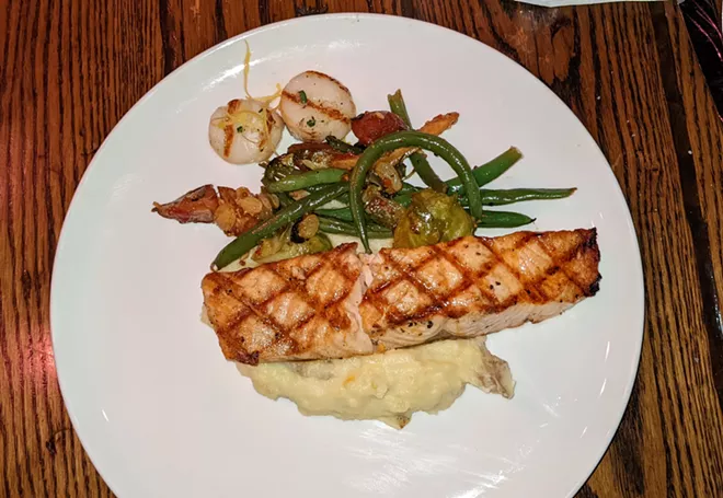Clinkerdagger's grilled salmon with scallops. - DAN NAILEN