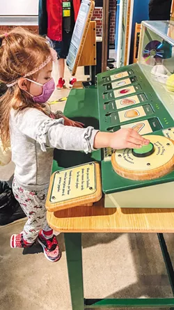 Learning about nutrition looks a lot like a game at the opening day of Mobius Discovery Center's new Eat Well Play Well exhibit. - MOBIUS PHOTOS
