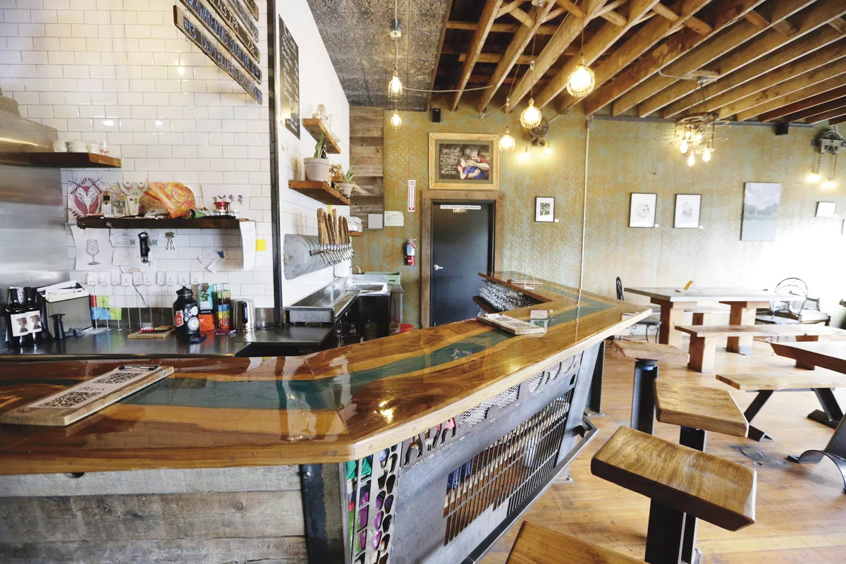 Drawing on his prior work in construction, Steve Moss built the brewery's furniture. - YOUNG KWAK PHOTO