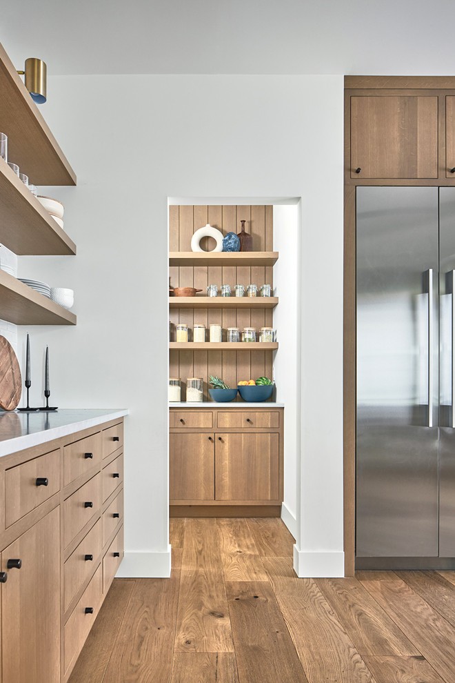 The cabinet doors and drawer fronts feature inset, single-slab front panels with aligned wood grain. - PATRICK MARTINEZ PHOTO
