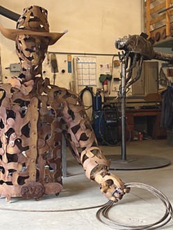 This giant cowboy is a work in progress. - CARRIE SCOZZARO PHOTO
