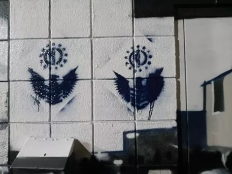 Patriot Front logos sprayed on a George Floyd mural downtown - DENNIS SMITH PHOTO