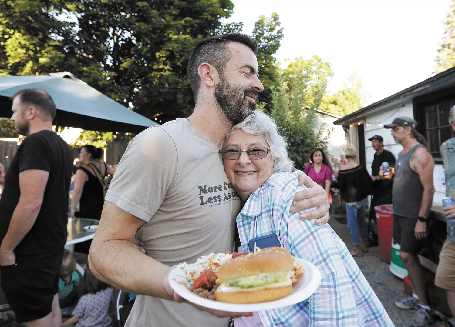 Photographer Adam Schlüter says connecting with strangers saved his life; he hopes others can find the magic in being vulnerable