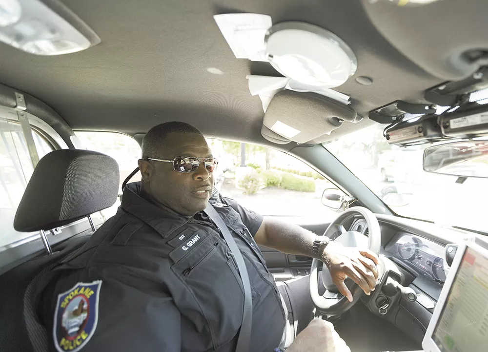 Spokane Police Officer Gordon Grant takes a humanist approach to policing. "I'm not a dick, but you're not going to run me over either." - YOUNG KWAK